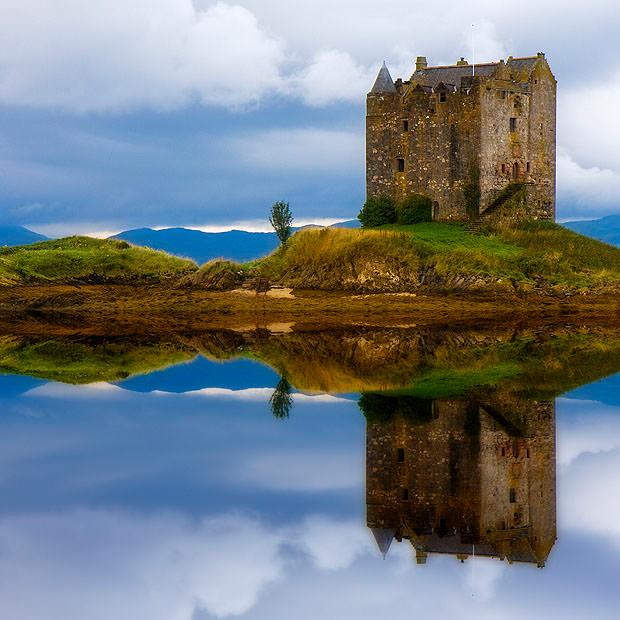 Castle reflected in water