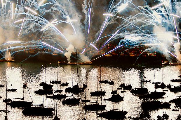 Fireworks reflected in a harbour full of boats
