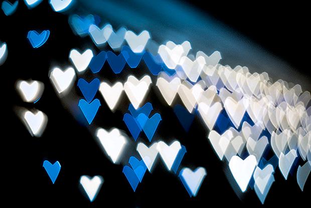 Blue and white heart shaped blurry lights