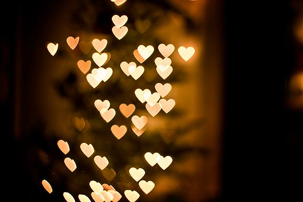 Christmas tree lights blurred in heart shapes