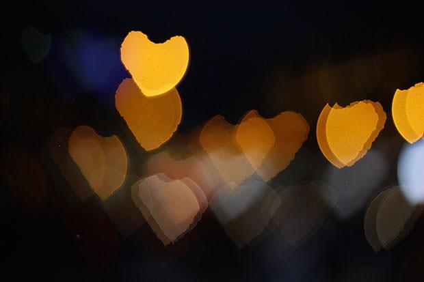 Blurry night lights shaped like hearts