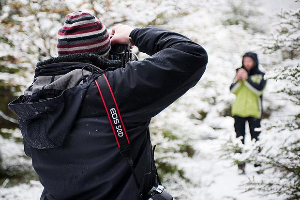 A photographer in the snow