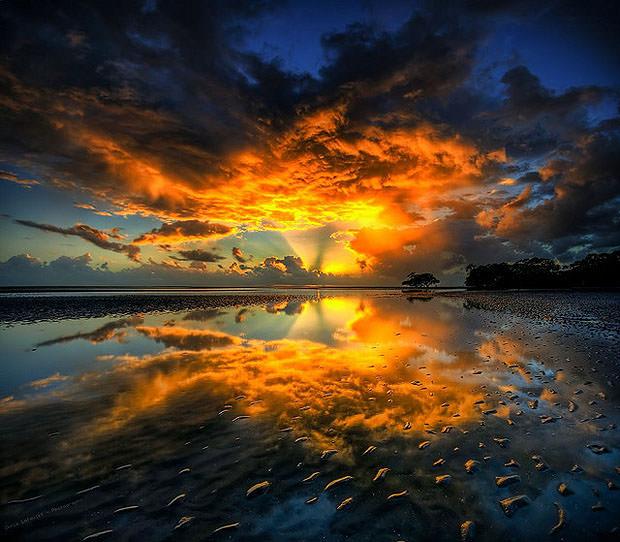 Sunrise reflected in water