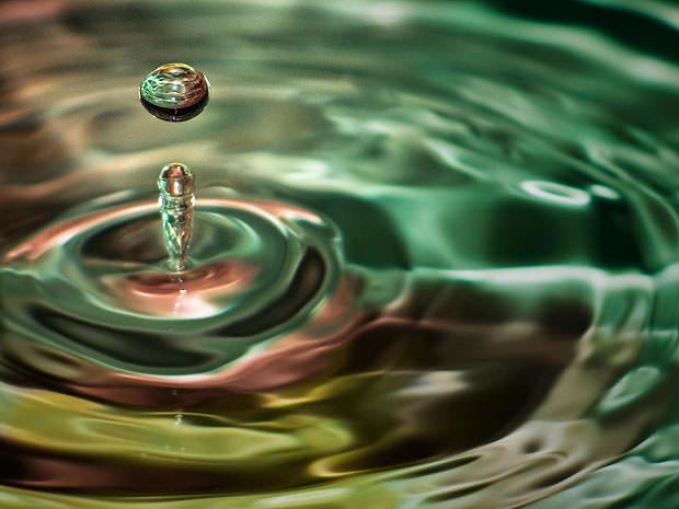 Water drop with colourful background